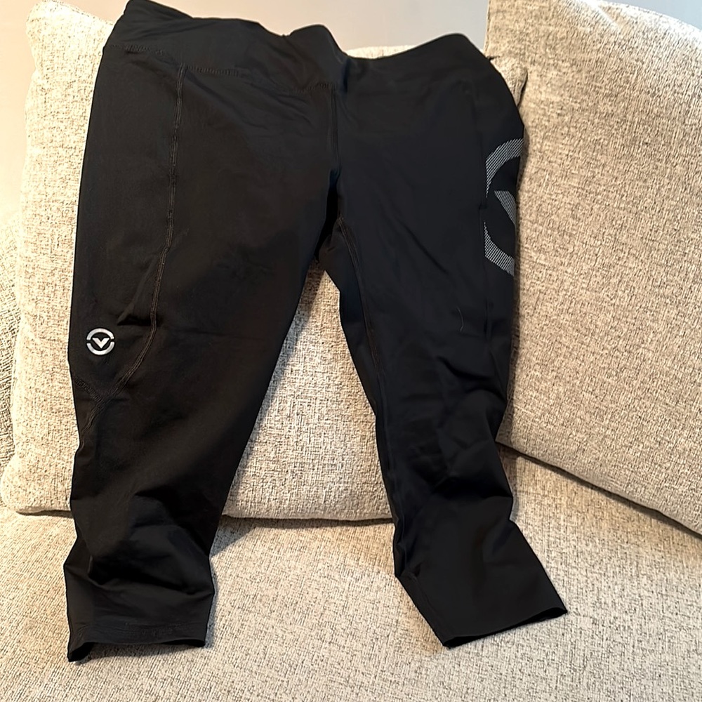 Virus workout leggings. Black with silver lettering.